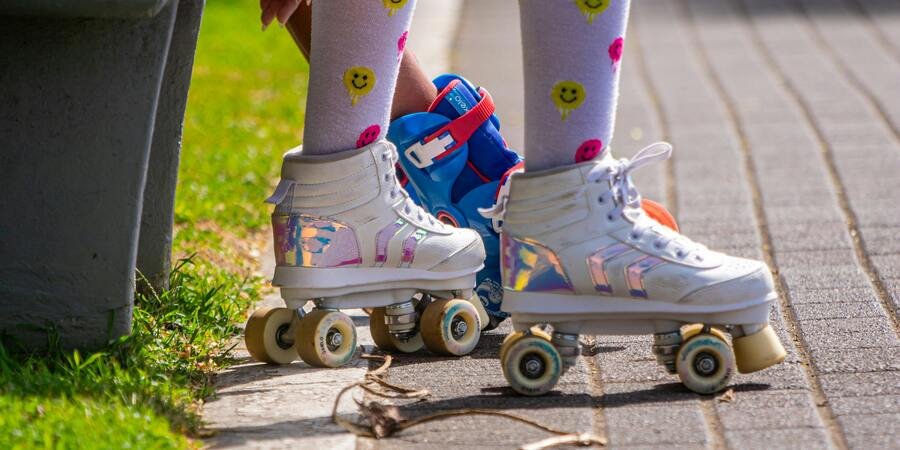 Toddler wearing skating shoes
